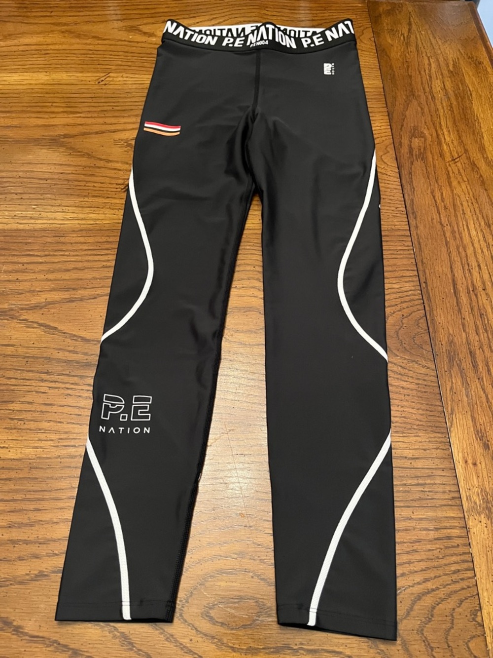 P.E Nation Black Fastest Lap Leggings with White Piping, size medium